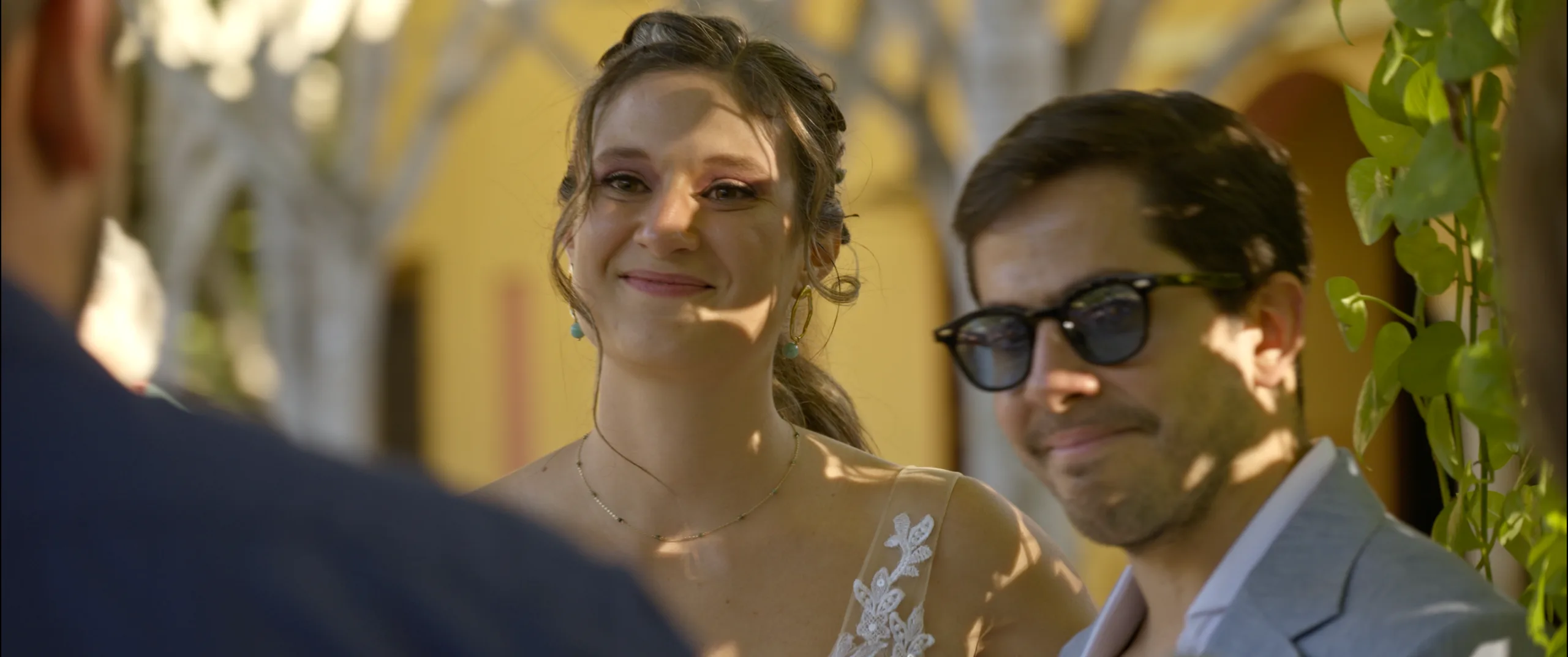 María and Fernando listening to family members speak during their ceremony at Hacienda Xtepen.